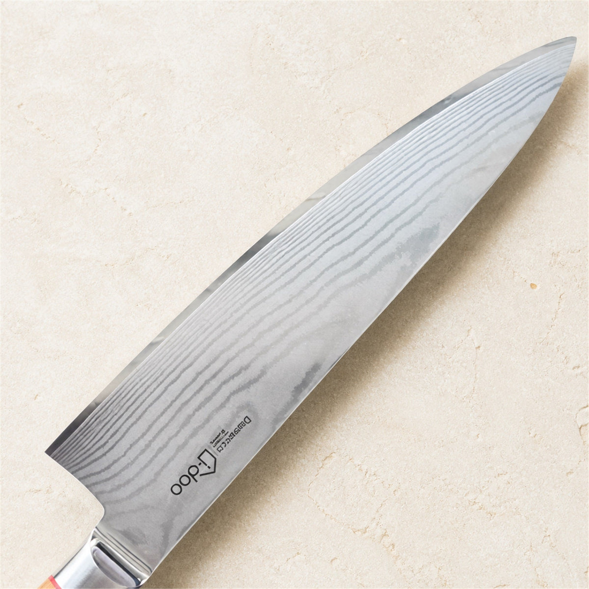 Close-up of the Damascus blade on the i-DOO Bondi Series chef’s knife