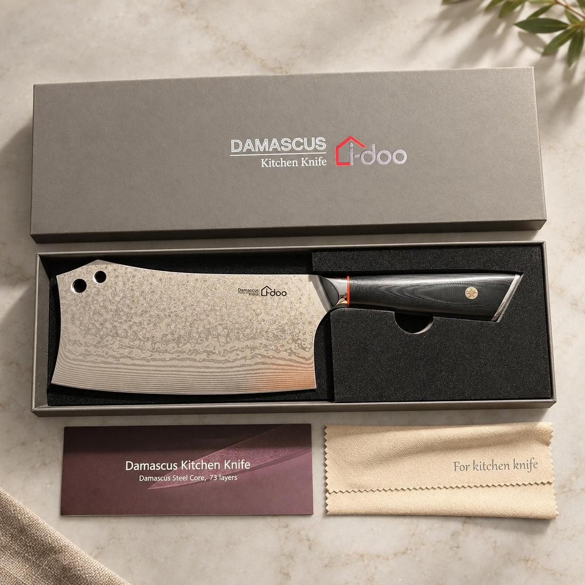 Summit 7-inch bone chopper in its fitted presentation box with lid, cleaning cloth and leaflet