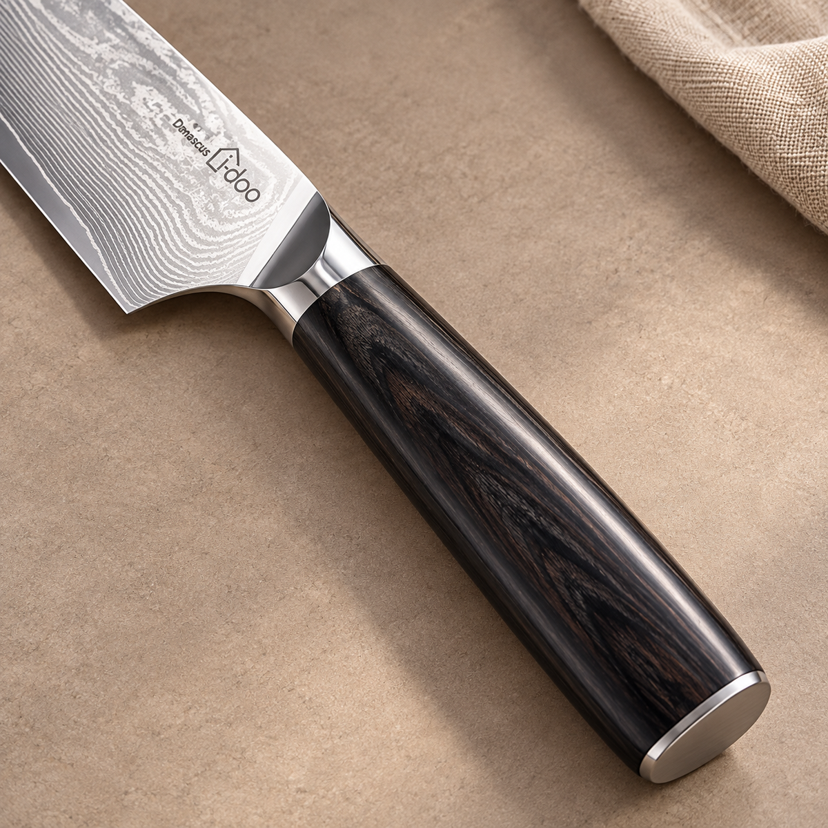 HJ knife dark wooden handle, polished bolster and patterned blade detail