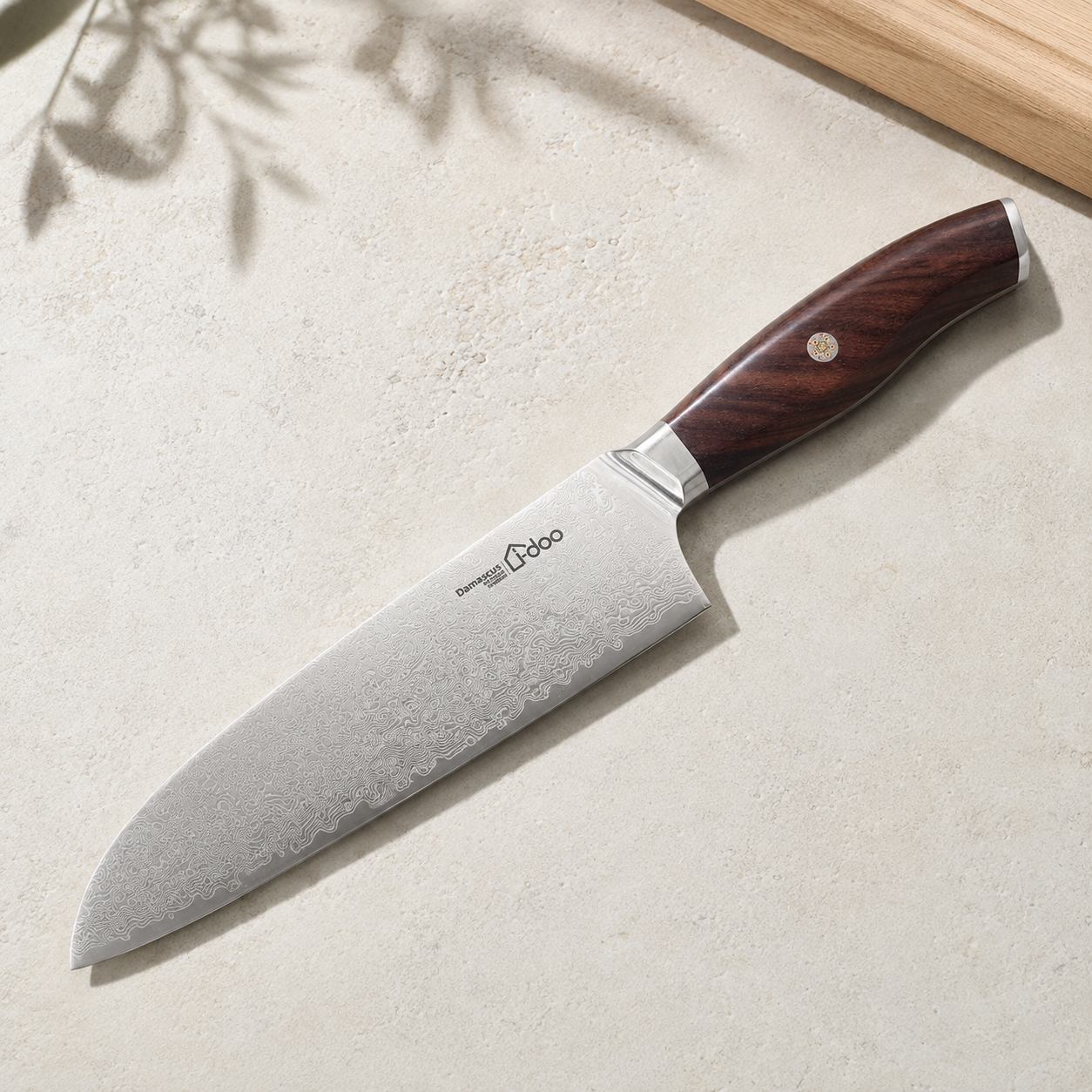Close detail of iDOO 67-layer Damascus blade and rosewood handle