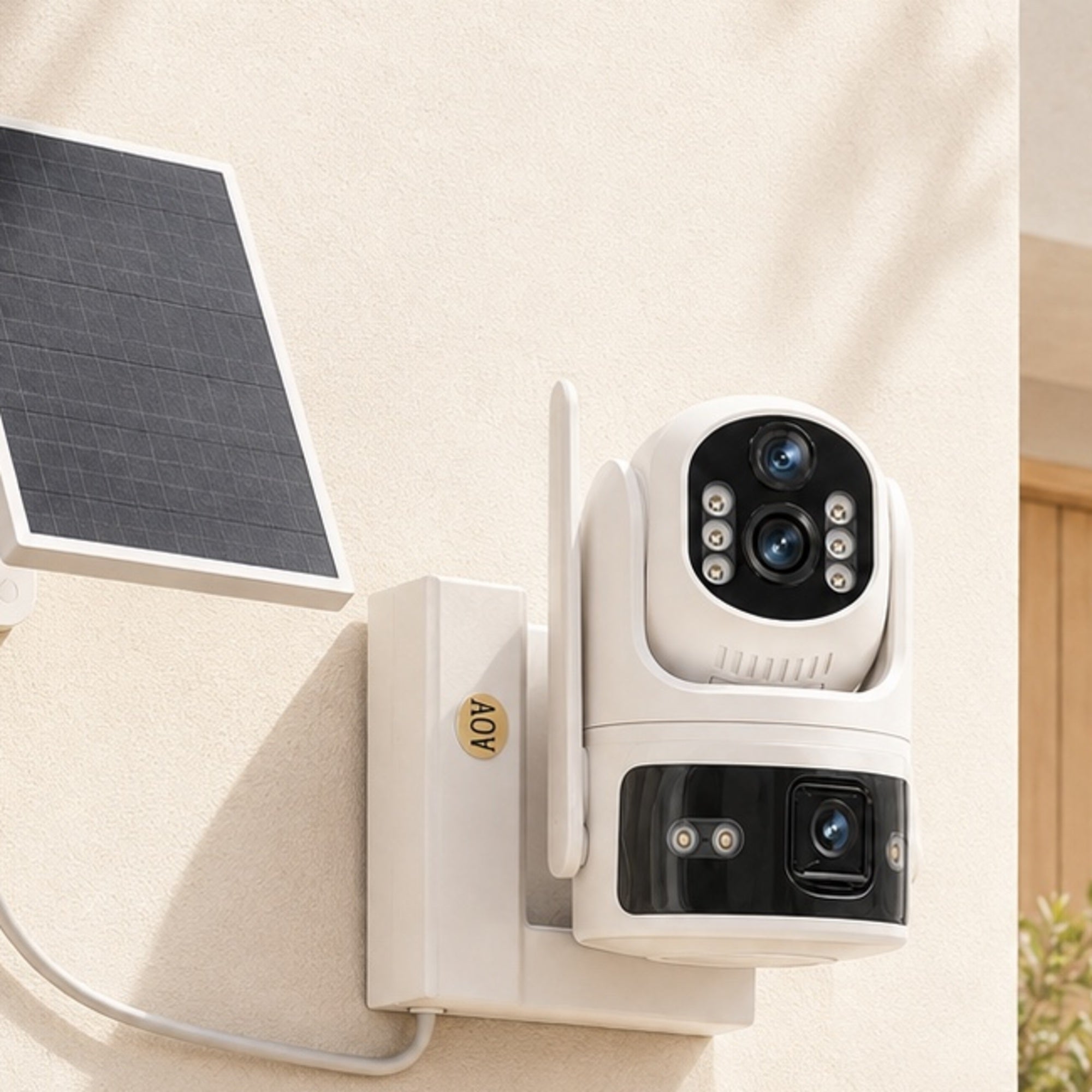 Solar dual-view security camera with solar panel mounted beside a home entrance